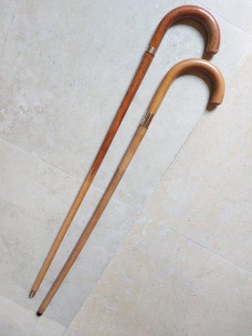 2 Elegant walking sticks with gold plated collar - ca. 1920