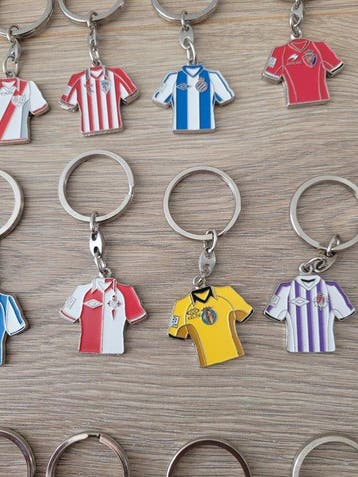 Volledige collectie T-shirts/sleutelhangers Spaanse Liga, Nieuw