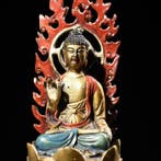 A polychrome brass statue of Shakyamuni Buddha from a