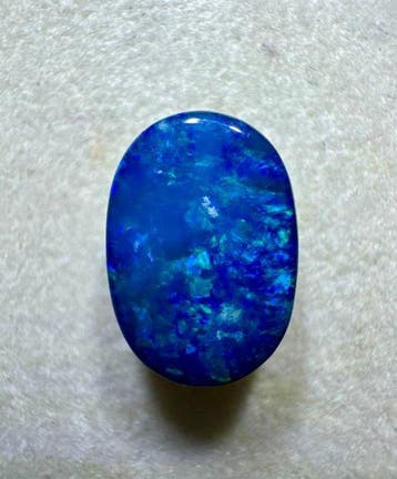 Opaal Cabochon - Hoogte: 11 mm - Breedte: 7 mm- 0.54 g - (1)