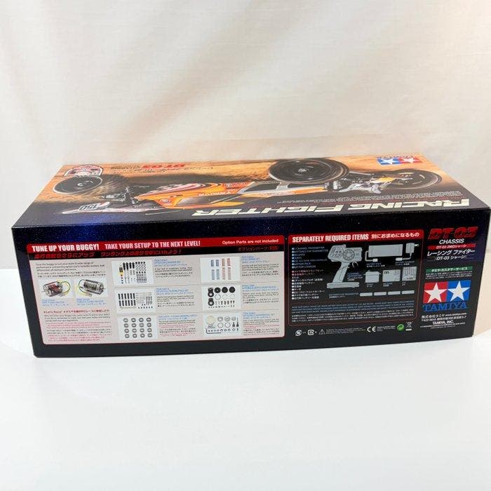 Tamiya 1:10 - Modelbouwdoos - Racing Fighter DT-03 Radio, Hobby en Vrije tijd, Modelauto's | 1:5 tot 1:12