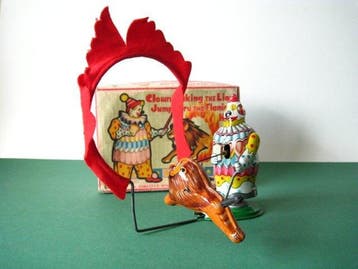 TPS - Clown laat de leeuw door de brandende hoepel springen