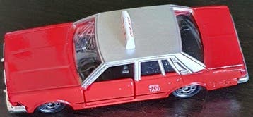 Tomica 1:65 - Modelauto - Nissan Cedric 280E Brougham