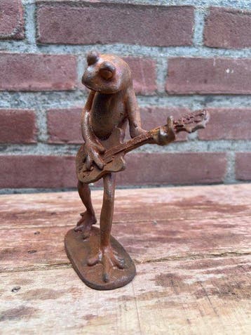 Decoratief ornament - Europa - Kikker die gitaar speelt