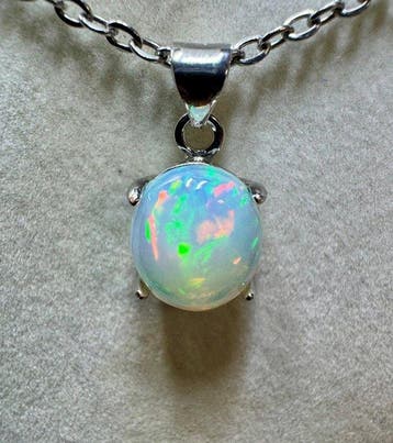 Opaal Cabochon - Hoogte: 20 mm - Breedte: 10 mm- 1.31 g -