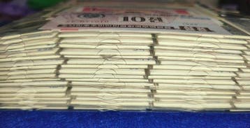 Wereldlot: 380 munten, plus 17 bankbiljetten in