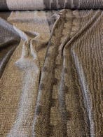 Weefsel met een grof geweven structuur en een neutrale,