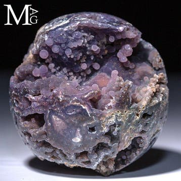 Sphère d’agate raisin pourpre vibrante avec cavités