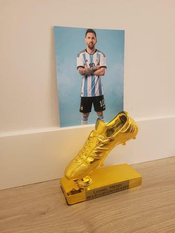 Soulier dor Leo Messi + Photographie Leo Messi