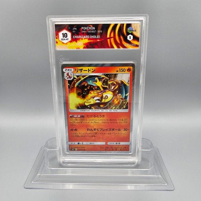 Graded card - CHARIZARD (HOLO) Tag Bolt - Graad 10, Hobby en Vrije tijd, Verzamelkaartspellen | Pokémon
