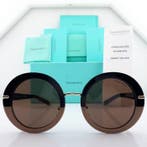 Tiffany & Co. - Round Black & Brown with Gold Tone Charm