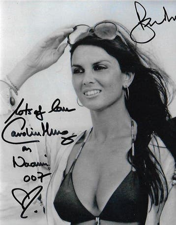 Roger Moore and Caroline Munro as Naomie - Autographed