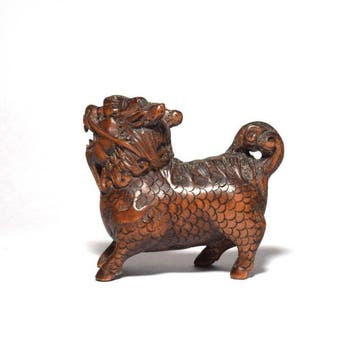Netsuke van een Shishi (Komainu) - Buxushout - Japan - Meiji, Antiek en Kunst