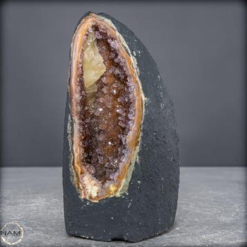 Zeldzame oranje-roze amethistdruse met calcietkristal uit