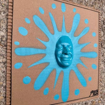gregos - Blue light smiling splash on paperboard