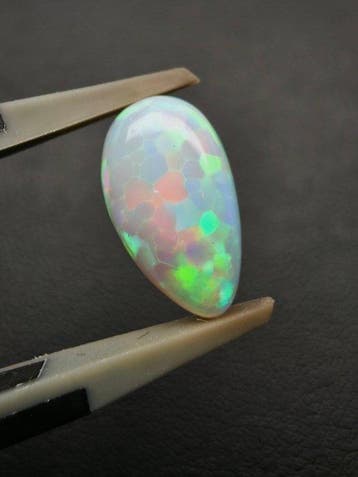 2.3cts Witte Opaal Cabochon- 0.46 g