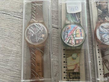 Collectie van memorabilia - Polshorloges -Swatch - Figuur