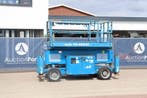 Veiling: Schaarlift Genie GS-4069 Diesel 14.12m 2012, Zakelijke goederen, Machines en Bouw | Liften, Steigers en Ladders, Ophalen