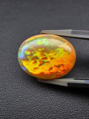 10.8cts Natural brown Opal Bright Fire Pattern | 4 K Video