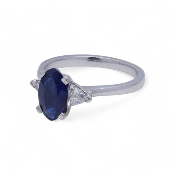 Ring Platina damesring met blauwe saffier en triljoen, Handtassen en Accessoires, Ringen