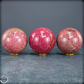 Magnifique ensemble de boules en rhodonite – Élégance