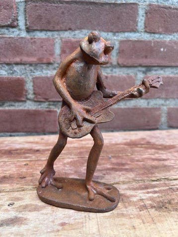 Decoratief ornament - Europa - Kikker die gitaar speelt