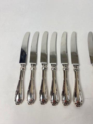 Bestekset (12) - Kruis- en Boogmotief - .800 zilver -