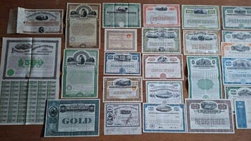 Document - 32 Original historic American railroad shares and