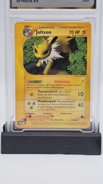 Pokémon - 1 Graded card - Jolteon 13/144 - GG 9 - WOTC -, Nieuw
