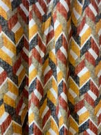 Exclusieve stof met geometrische patronen in dubbele hoogte,