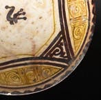 Islamitisch Middeleeuwse kom uit Nishapur met vogel