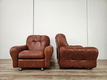 Fauteuil (2) - Paire de fauteuils en cuir des années 70 -