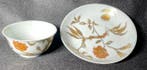 Sorbet en zijn schaaltje met decoraties van gouden bloemen