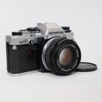 Olympus OM-10 + F.Zuiko Auto-S 1:1.8 f=50mm Appareil photo, Audio, Tv en Foto, Fotocamera's Analoog, Nieuw
