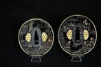 IJzeren tsuba, gesigneerd Soten School, goudinleg. - ijzer -