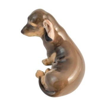 Royal Copenhagen - Beeldje - Dachshund sitting on its side