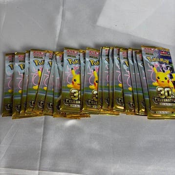 Pokémon - 20 Booster pack - Free Ship Pokemon TCG 30th