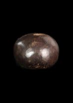 West-Aziatisch Donkerbruine hardsteen Stempel met een