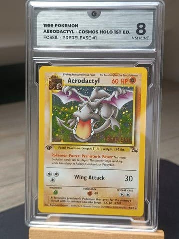 Pokémon - 1 Graded card - Aerodactyl Première édition - GG 8, Hobby & Loisirs créatifs