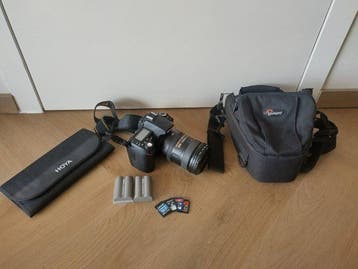 Nikon D90 + AF-S DX Nikkor 18-200mm f/3.5-5.6G ED VR, Audio, Tv en Foto, Nieuw