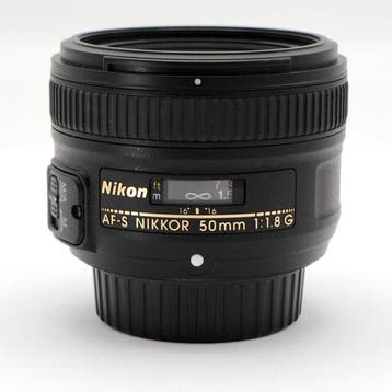 Nikon AF-S 50mm f/1.8G met HB-47 zonnekap, filter en, Nieuw