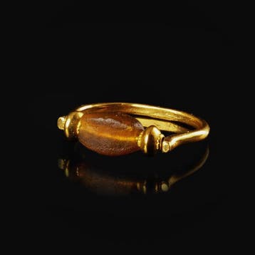 Romain antique Bague avec perle en verre couleur ambre, Bijoux, Sacs & Beauté