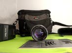 Rollei SL35 + Carl Zeiss 2.8/85mm + flash Metz 30B3 + borsa