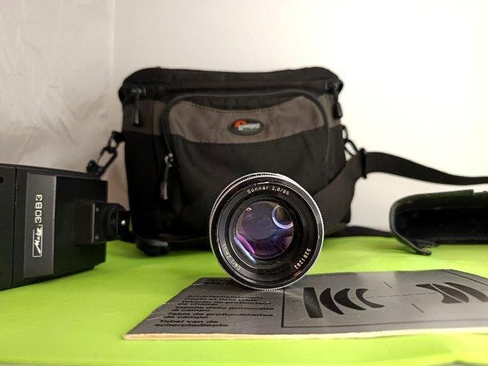 Rollei SL35 + Carl Zeiss 2.8/85mm + flash Metz 30B3 + borsa, Audio, Tv en Foto, Fotocamera's Analoog