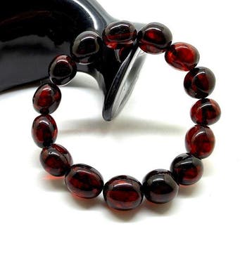 Armband met grote Baltische amber kralen, 22,4 gram, in