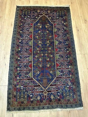 Tapis baloutche traditionnel tissé à la main, originaire