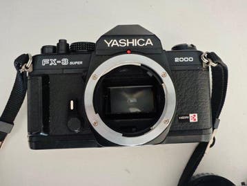 Yashica FX-3 Super 2000 + 50mm + Vivitar 70-210mm | Single