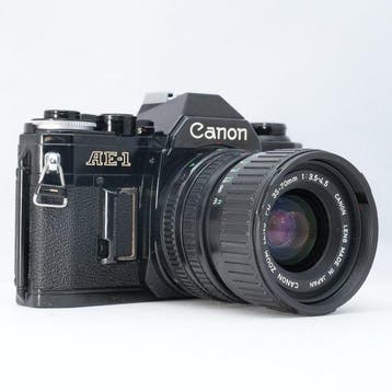 Canon AE-1 Black + FD 35-70mm F3.5-4.5 Analoge camera, Nieuw