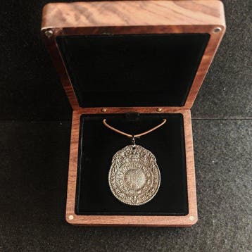Pendentif zodiaque en météorite Muonionalusta avec écrin en
