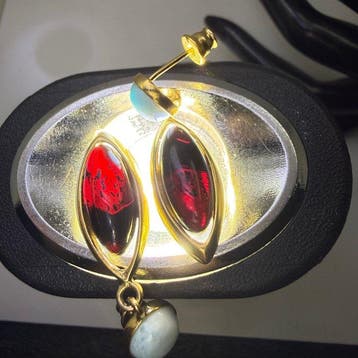 Oorbellen met echte Baltische barnsteen en Larimar, in